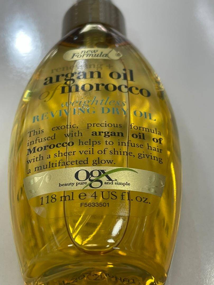 اسپری روغن آرگان اوجی ایکس OGX مدل Argan Oil of Morocco – ضد موخوره، صاف کننده و ضد وز – 118 میل